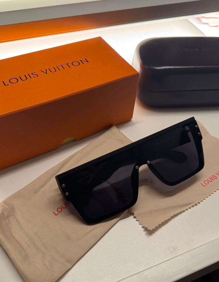 Oversized black shield sunglasses with hard case and orange presentation box